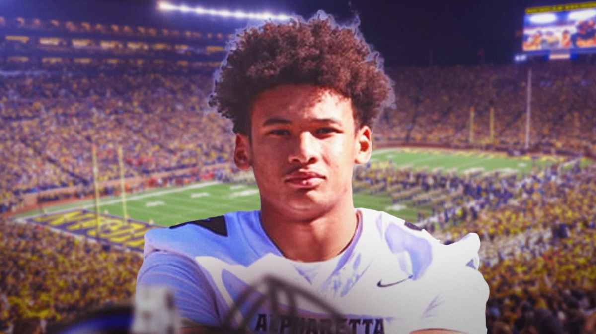Michigan football, Wolverines, Michigan football recruiting, Julius Holly, Julius Holly Michigan, Julius Holly (high school football player) with Michigan football stadium in the background