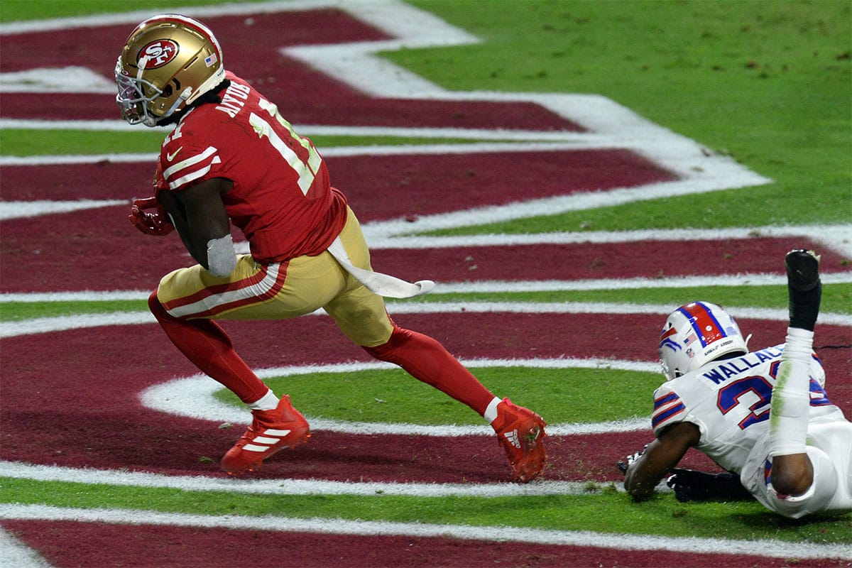 San Francisco 49ers wide receiver Brandon Aiyuk (11) catches a touchdown pass against the Buffalo Bills during the first half at State Farm Stadium. 