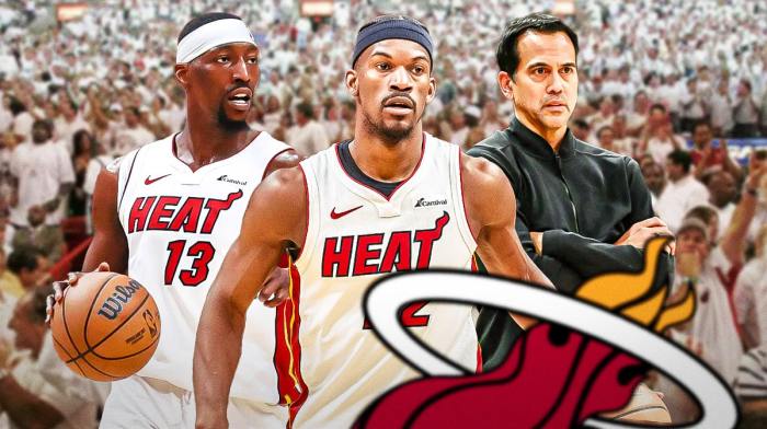 Miami Heat stars Jimmy Butler, Bam Adebayo, and head coach Erik Spoelstra in front of the Kaseya Center.