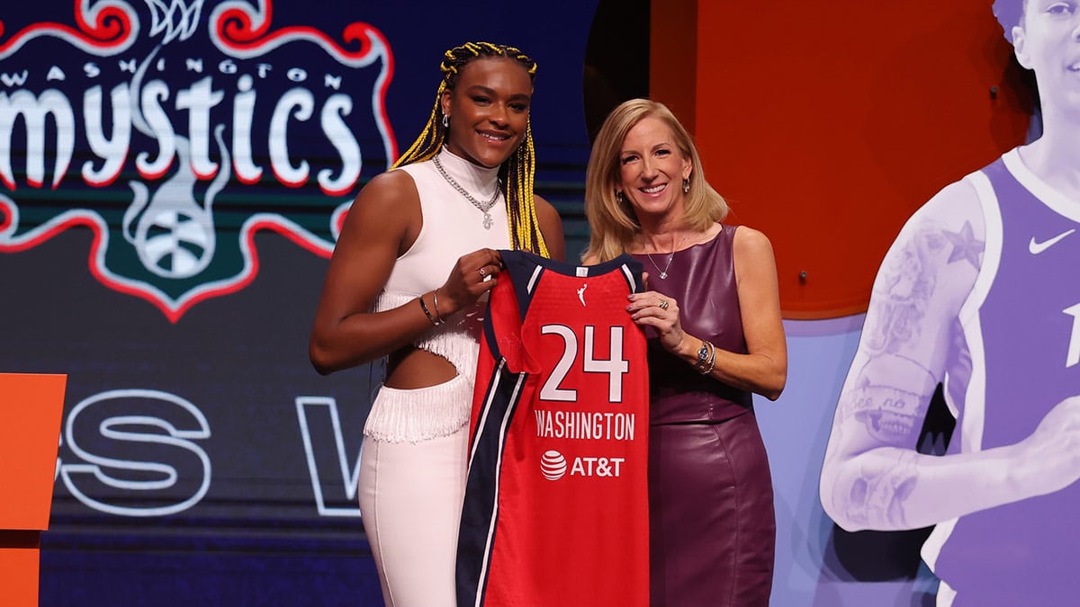 Aaliyah Edwards poses with WNBA commissioner Cathy Engelbert after she is selected with the number six overall pick to the Washington Mystics in the 2024 WNBA Draft at Brooklyn Academy of Music.
