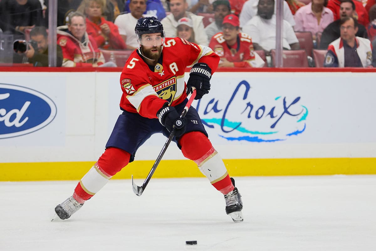 Florida Panthers defenseman Aaron Ekblad (5) moves the puck against the Boston Bruins during the second period in game one of the second round of the 2024 Stanley Cup Playoffs at Amerant Bank Arena
