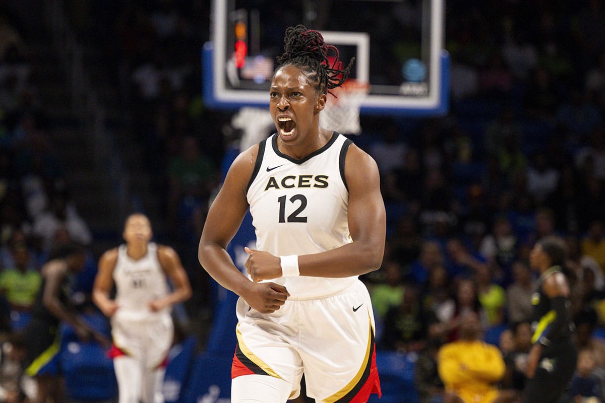 Las Vegas Aces guard Chelsea Gray (12) celebrates during the first half against the Dallas Wings during game three of the 2023 WNBA Playoffs at College Park Center