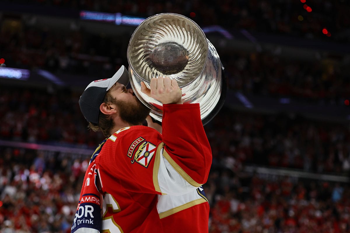 Florida Panthers forward Aleksander Barkov (16) kisses the Stanley Cup after defeating the Edmonton Oilers in game seven of the 2024 Stanley Cup Final at Amerant Bank Arena.