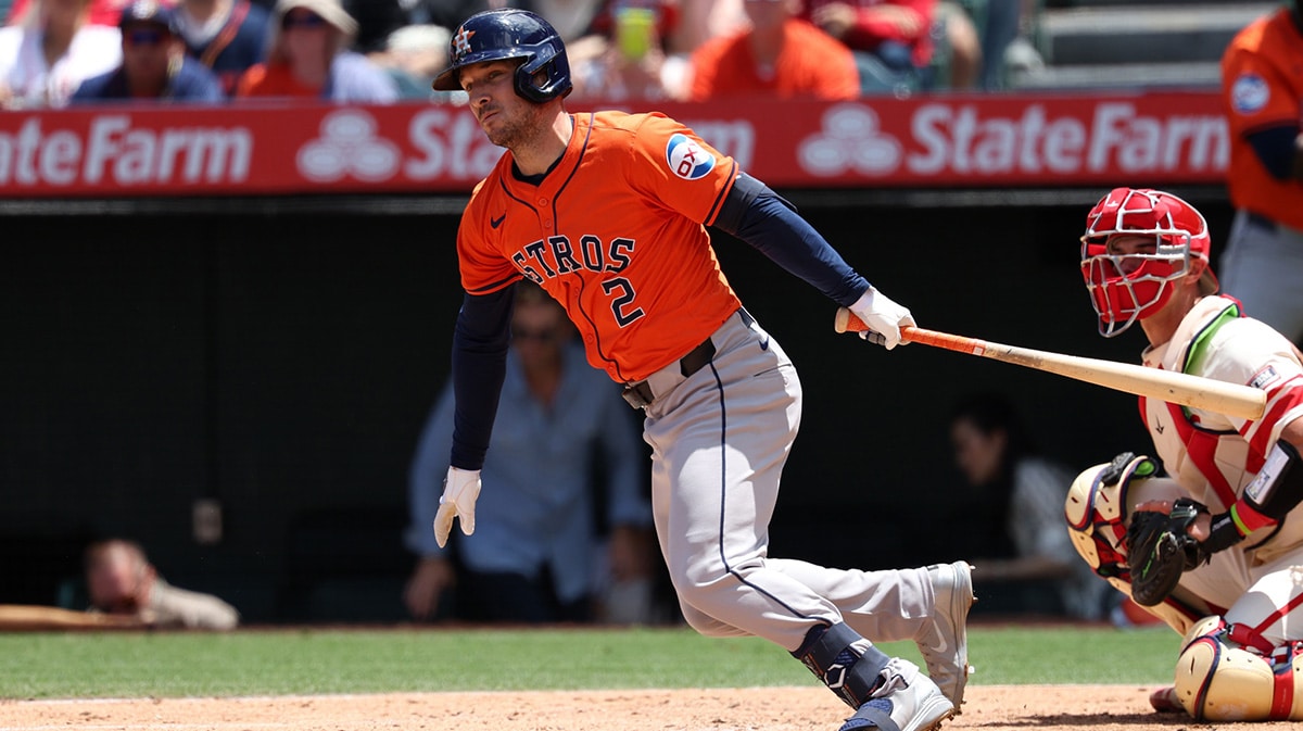 Houston Astros third baseman Alex Bregman (2) hits an RBI double during the third inning against the Los Angeles Angels at Angel Stadium. 