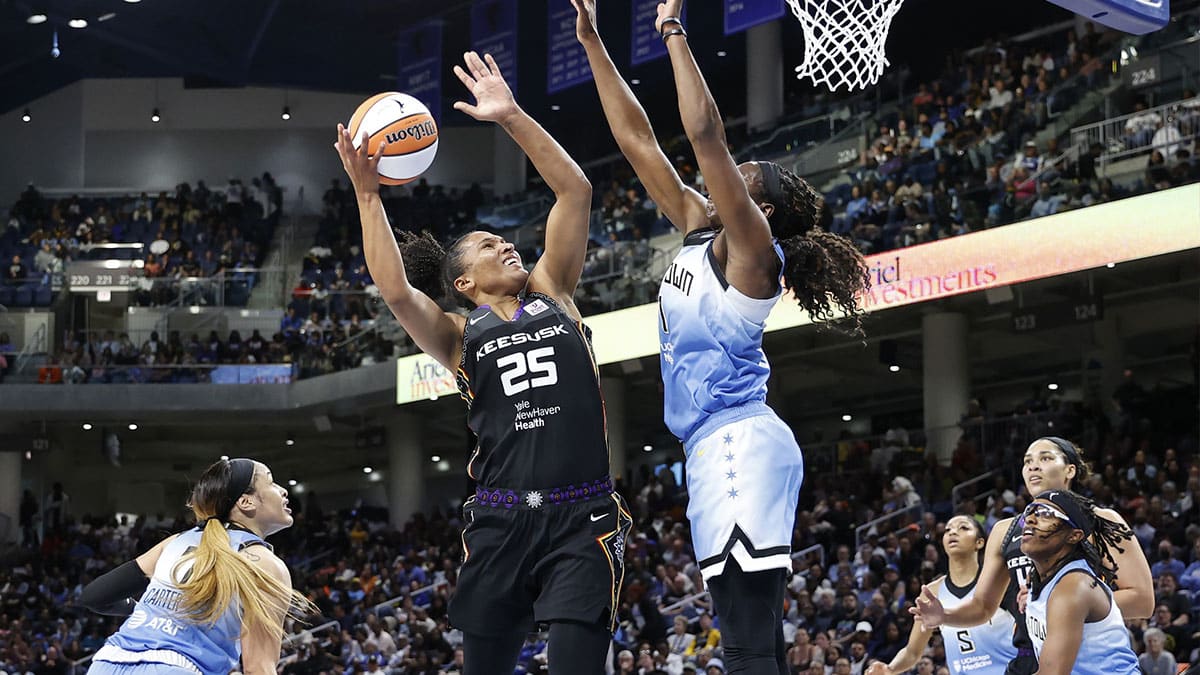 Connecticut Sun forward Alyssa Thomas (25) goes to the basket against the Chicago Sky during the first half of a WNBA game at Wintrust Arena.