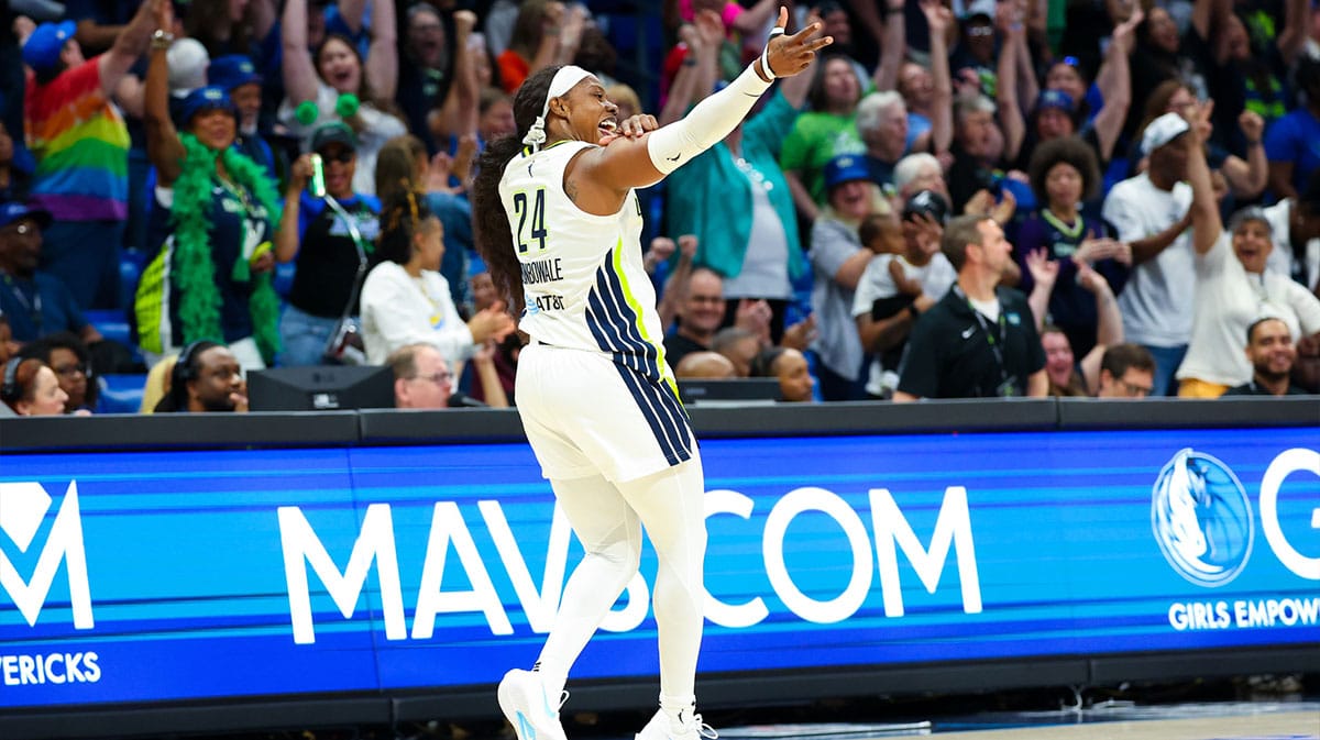 Dallas Wings guard Arike Ogunbowale (24) reacts after scoring during the fourth quarter against the Chicago Sky at College Park Center.