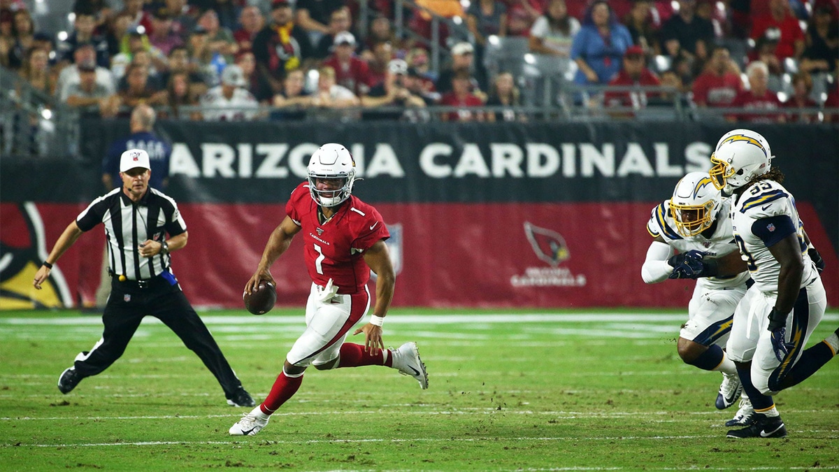 Arizona Cardinals quarterback Kyler Murray (1) eludes Los Angeles Chargers linebacker Chris Peace (40) and defensive tackle Justin Jones (93) in the first half during a preseason game on Aug. 8, 2019 in Glendale, Ariz.