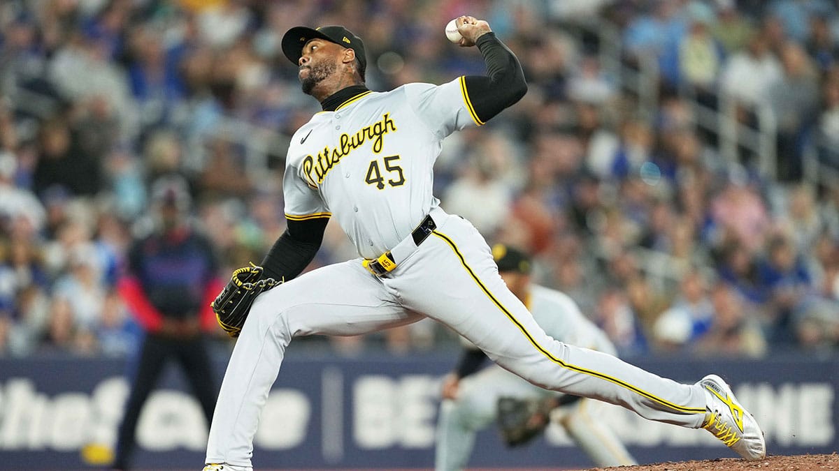 May 31, 2024; Toronto, Ontario, CAN; Pittsburgh Pirates relief pitcher Aroldis Chapman (45) throws a pitch against the Toronto Blue Jays during the eighth inning at Rogers Centre.