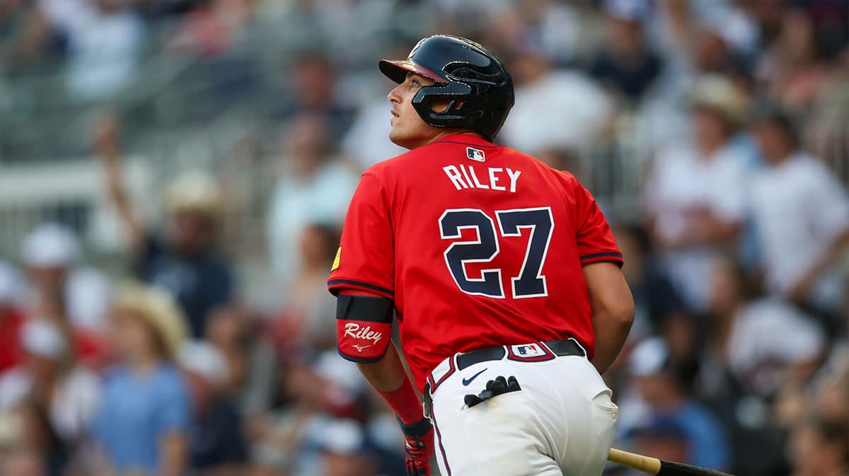 Atlanta Braves third baseman Austin Riley (27) hits a two-run home run against the Tampa Bay Rays in the second inning at Truist Park. 