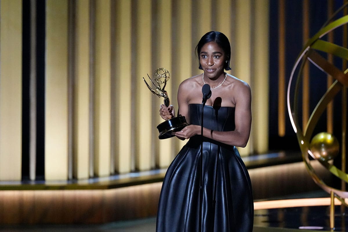Ayo Edebiri accepting an award at the 2024 Emmys.
