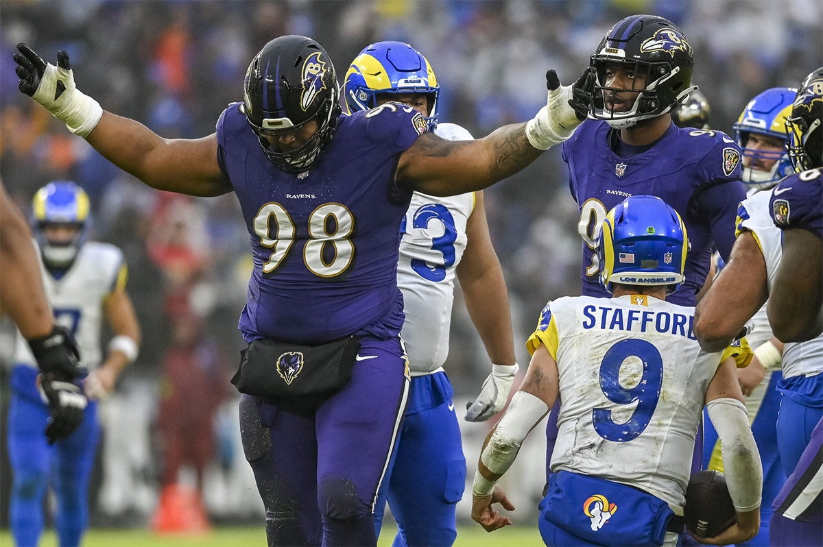 Baltimore Ravens defensive tackle Travis Jones (98) reacts after sacking Los Angeles Rams quarterback Matthew Stafford (9) during the second half at M&T Bank Stadium. 