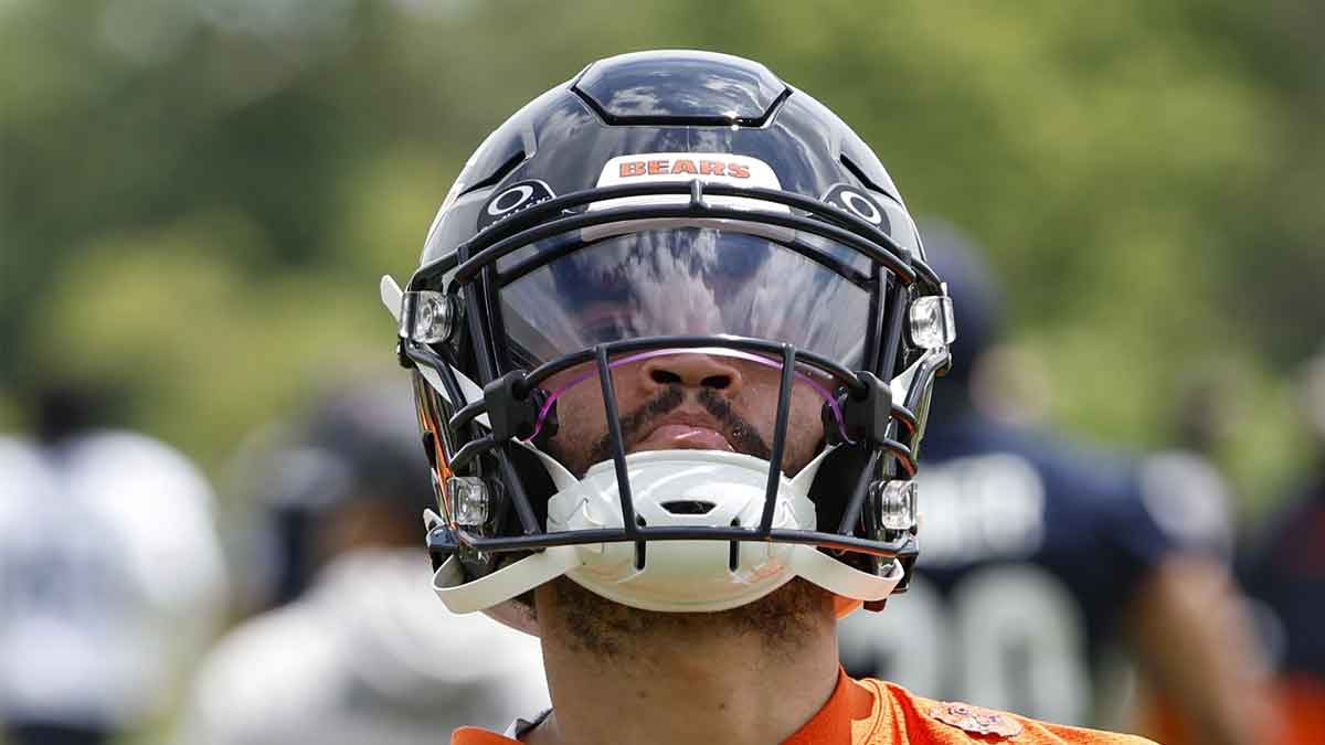 Bears quarterback Caleb Williams (18) warms up during the team's minicamp at Halas Hall.