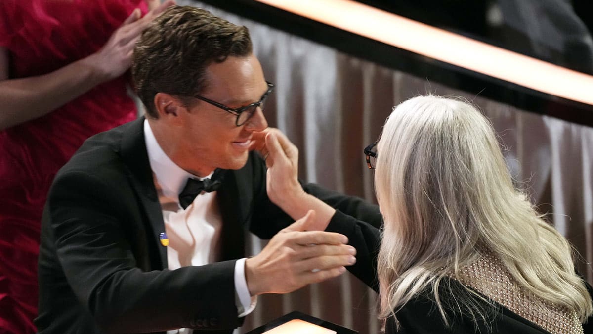 Benedict Cumberbatch embracing Jane Campion at the Oscars.