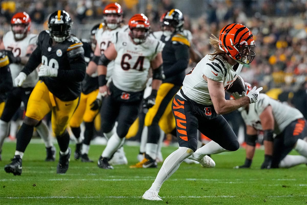 Cincinnati Bengals wide receiver Trenton Irwin (16) runs with a catch in the second quarter of the NFL 16 game between the Pittsburgh Steelers and the Cincinnati Bengals at Acrisure Stadium in Pittsburgh on Saturday, Dec. 23, 2023. The Steelers led 24-0 at halftime.