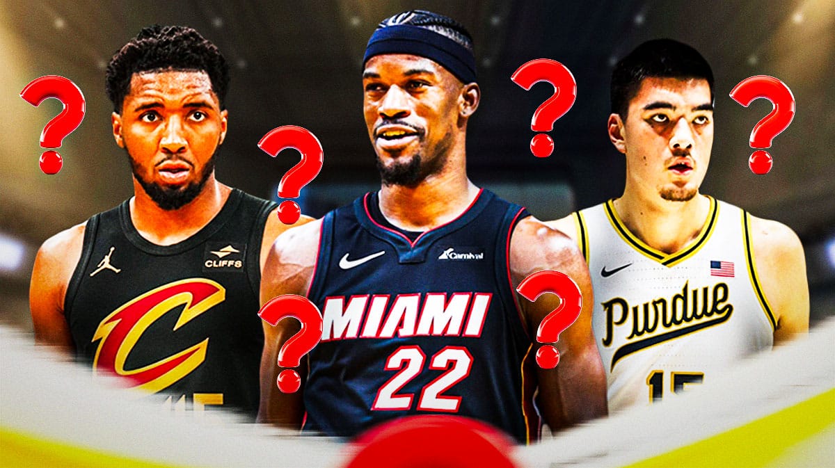 Miami Heat star Jimmy Butler next to Zach Edey and Donovan Mitchell in front of Kaseya Center.