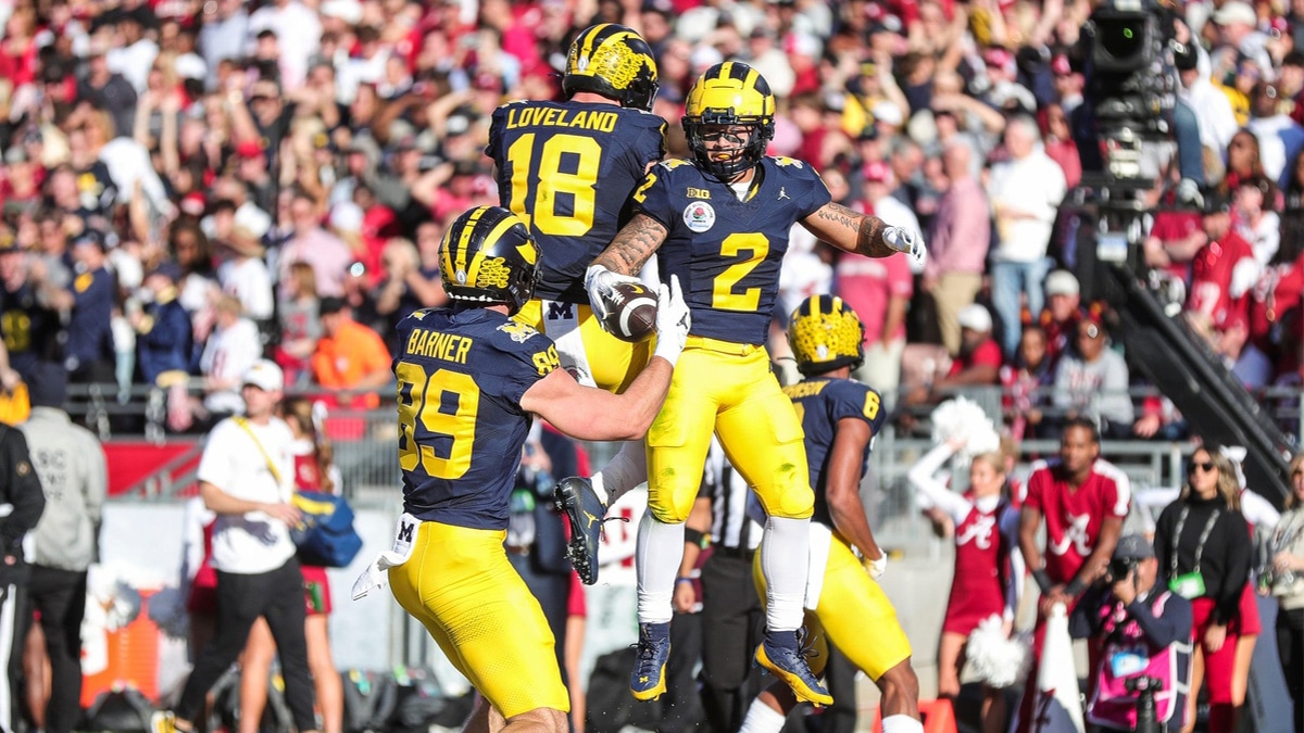 Michigan running back Blake Corum celebrates a touchdown against Alabama during the first half of the Rose Bowl