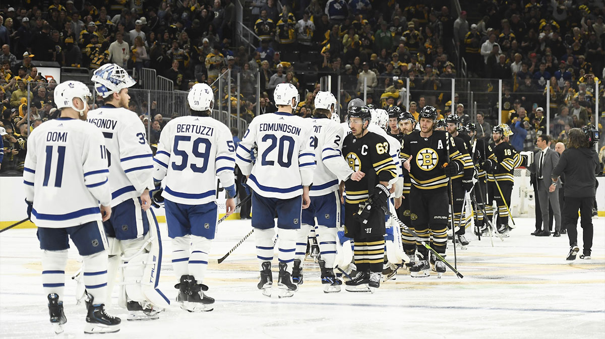 The Toronto Maple Leafs and Boston Bruins shake hands after the Bruins defeated the Leafs in overtime in game seven of the first round of the 2024 Stanley Cup Playoffs at TD Garden.