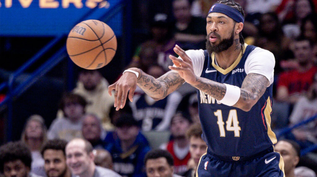 New Orleans Pelicans forward Brandon Ingram (14) passes the ball against the Cleveland Cavaliers during the first half at Smoothie King Center. 