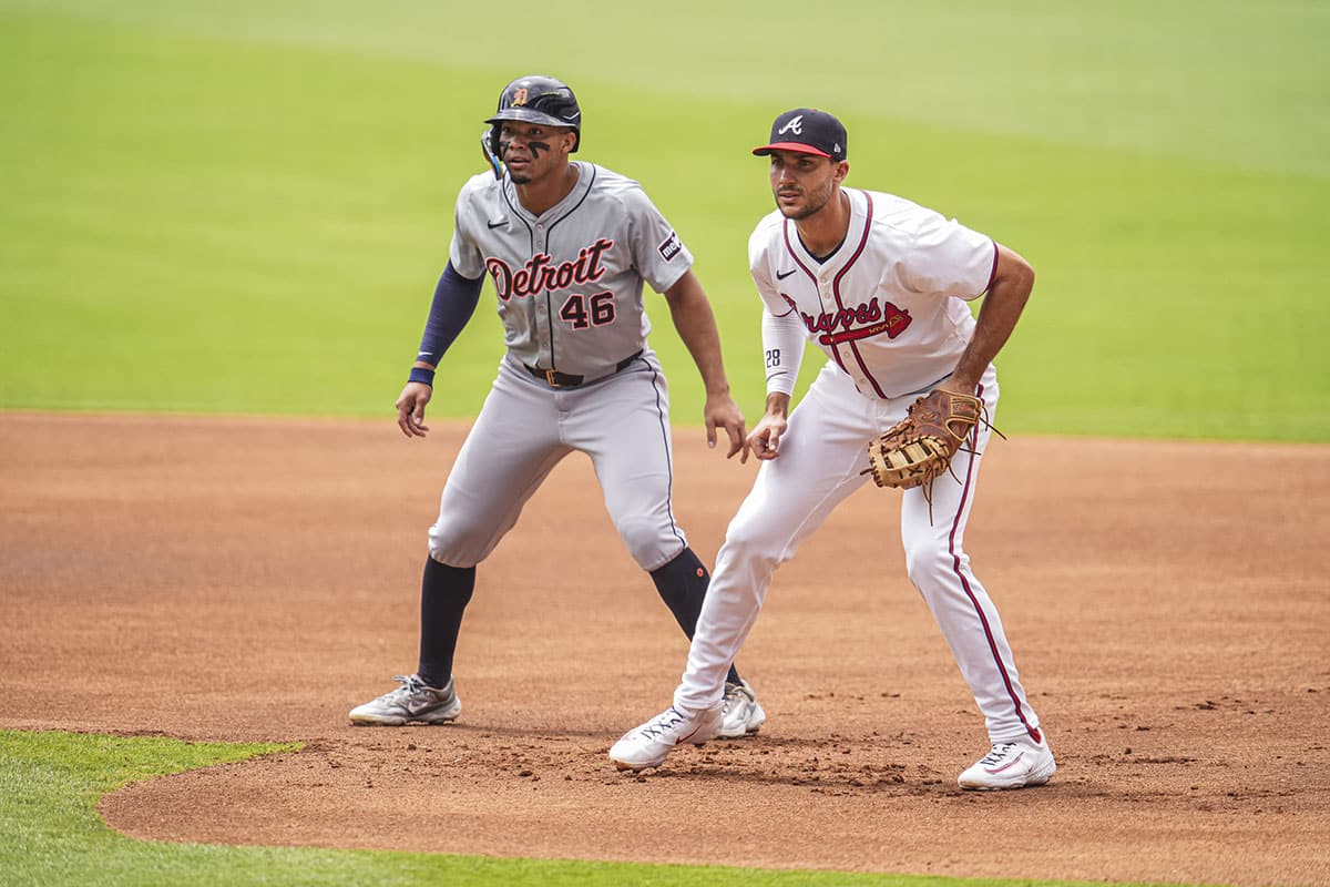 Detroit Tigers right fielder Wenceel Perez (46) leads off of first base behind Atlanta Braves first baseman Matt Olson (28) during the first inning at Truist Park. 