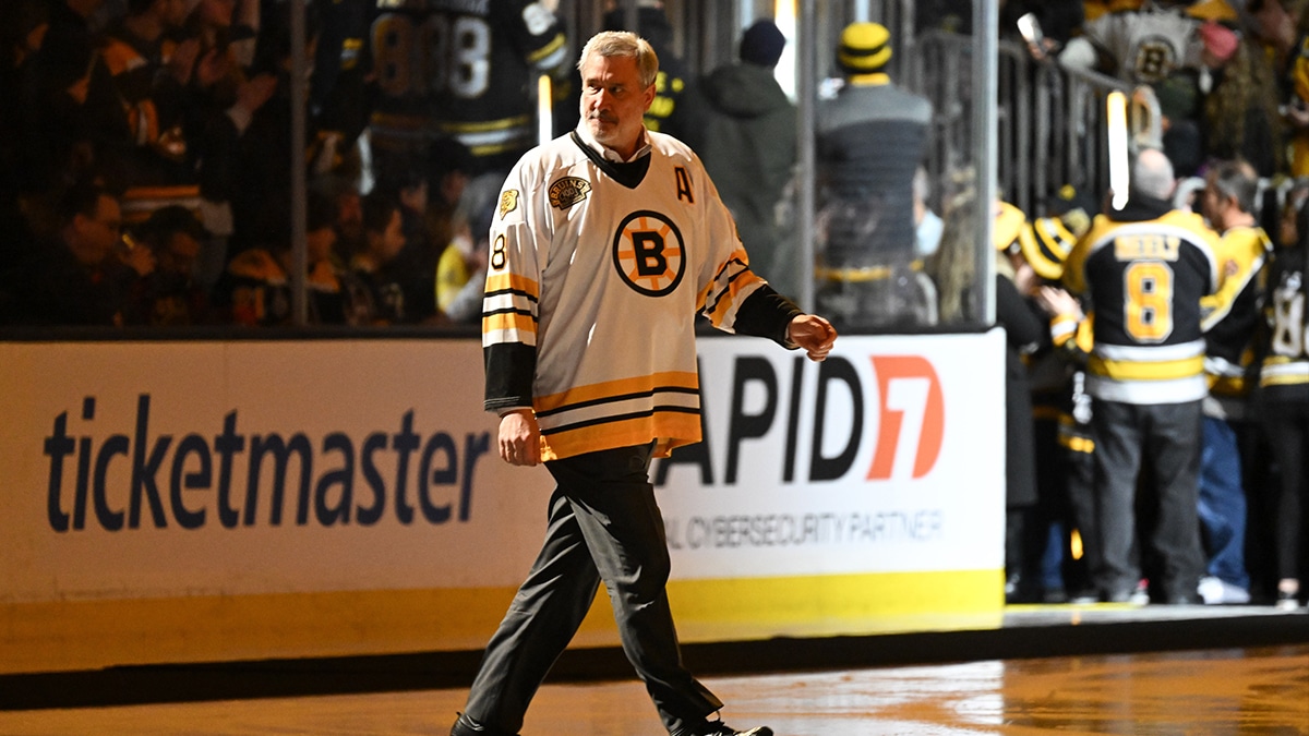 Former Boston Bruins Cam Neely walks onto the ice during a ceremony before before a game against the Montreal Canadiens at the TD Garden. 