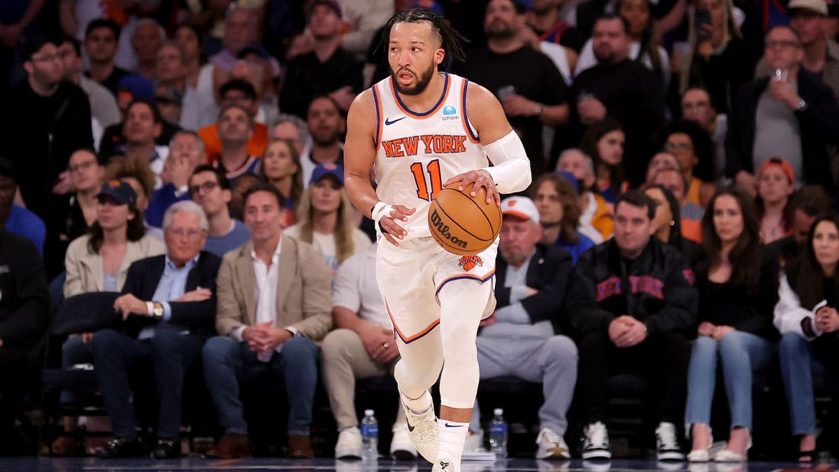 New York Knicks guard Jalen Brunson (11) brings the ball up court against the Indiana Pacers during the third quarter of game seven of the second round of the 2024 NBA playoffs at Madison Square Garden.