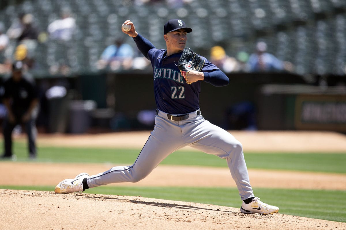 Seattle Mariners starting pitcher Bryan Woo (22) delivers a pitch against the Oakland Athletics during the second inning at Oakland-Alameda County Coliseum.