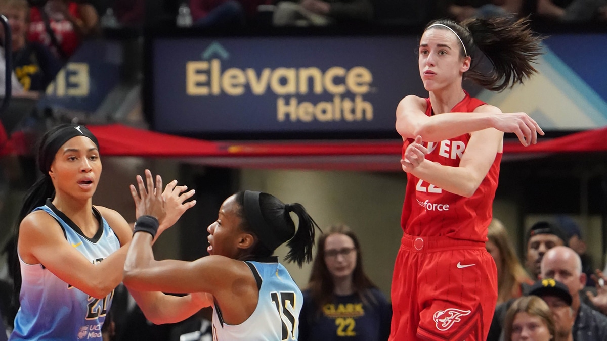 June 1, 2024; Indianapolis, IN, USA; Indiana Fever guard Caitlin Clark (22) passes the ball during a game between the Indiana Fever and the Chicago Sky on Saturday, June 1, 2024, at Gainbridge Fieldhouse in Indianapolis