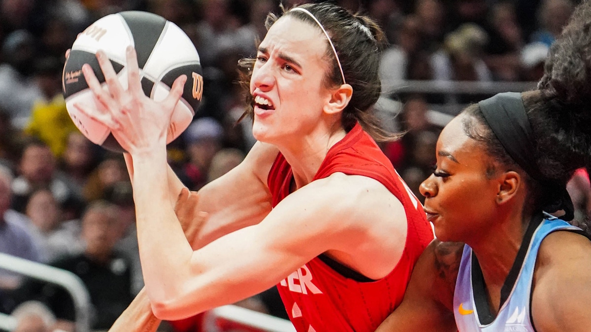 Indiana Fever guard Caitlin Clark (22) drives toward the basket against the Chicago Sky during a game at Grainbridge Fieldhouse.