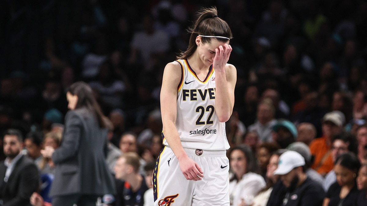 Indiana Fever guard Caitlin Clark (22) walks back to the bench in the third quarter against the New York Liberty at Barclays Center.