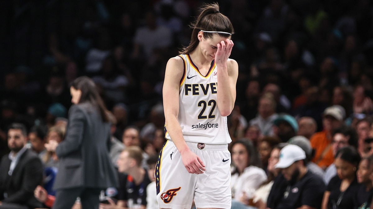 Indiana Fever guard Caitlin Clark (22) walks back to the bench in the third quarter against the New York Liberty at Barclays Center.