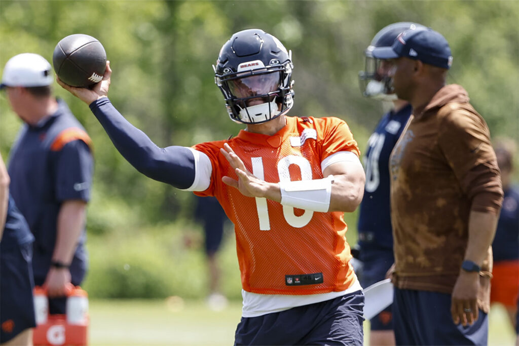 Chicago Bears quarterback Caleb Williams (18) throws the ball during organized team activities at Halas Hall.