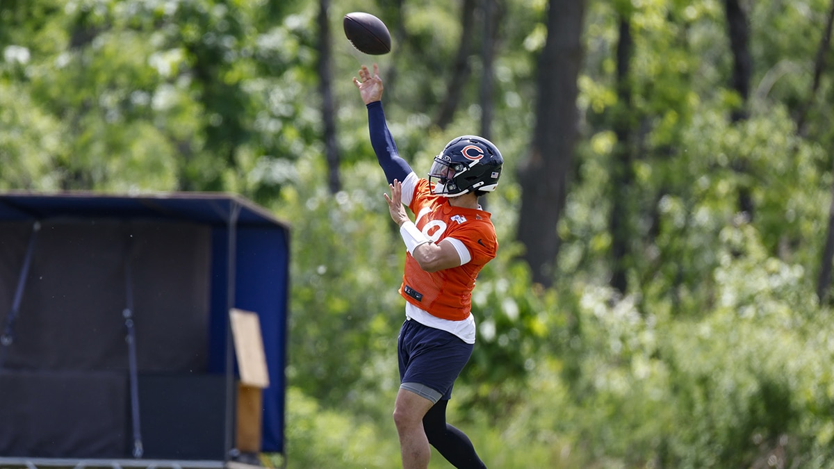 Chicago Bears quarterback Caleb Williams (18) throws the ball during organized team activities at Halas Hall. 