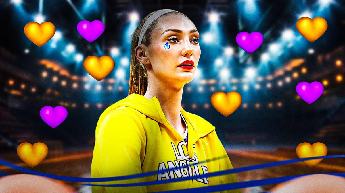 Cameron Brink with a tear drop. Purple and yellow hearts all around her