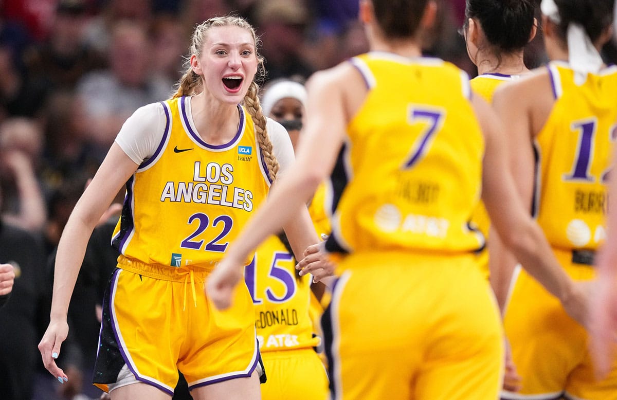 Los Angeles Sparks forward Cameron Brink (22) yells in excitement Tuesday, May 28, 2024, during the game at Gainbridge Fieldhouse in Indianapolis. The Los Angeles Sparks defeated the Indiana Fever, 88-82.