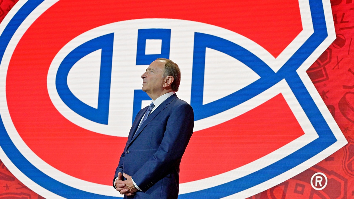 NHL commissioner Gary Bettman looks on before Filip Mesar (not pictured) is selected as the number twenty-six overall pick to the Montreal Canadiens in the first round of the 2022 NHL Draft at Bell Centre.