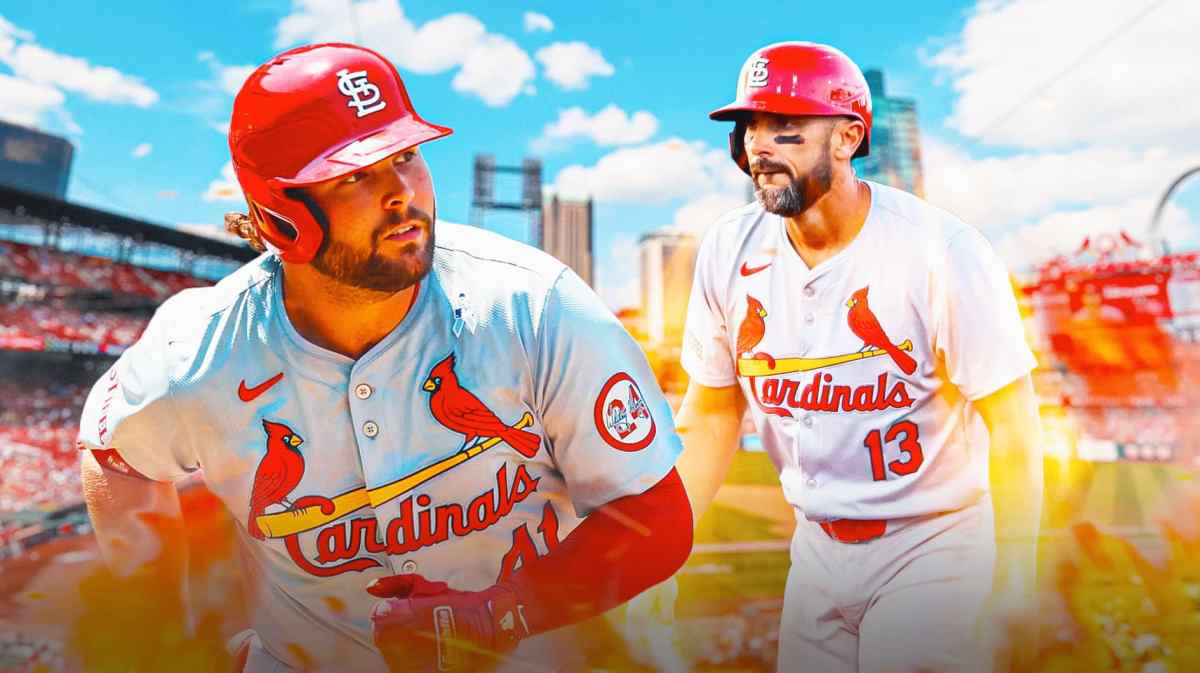 Cardinals' Alec Burleson stands next to Matt Carpenter, Giants stand in background