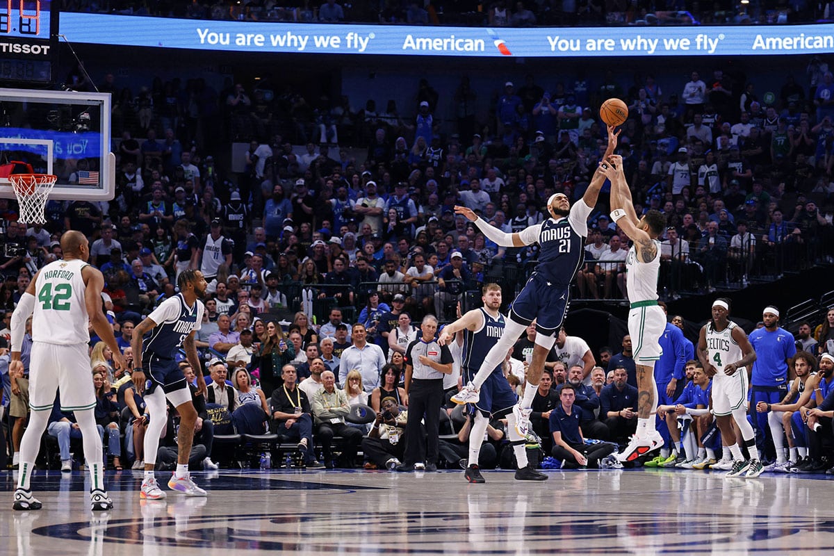 Dallas Mavericks center Daniel Gafford (21) blocks the shot of Boston Celtics forward Jayson Tatum (0) during the third quarter during game four of the 2024 NBA Finals at American Airlines Center.