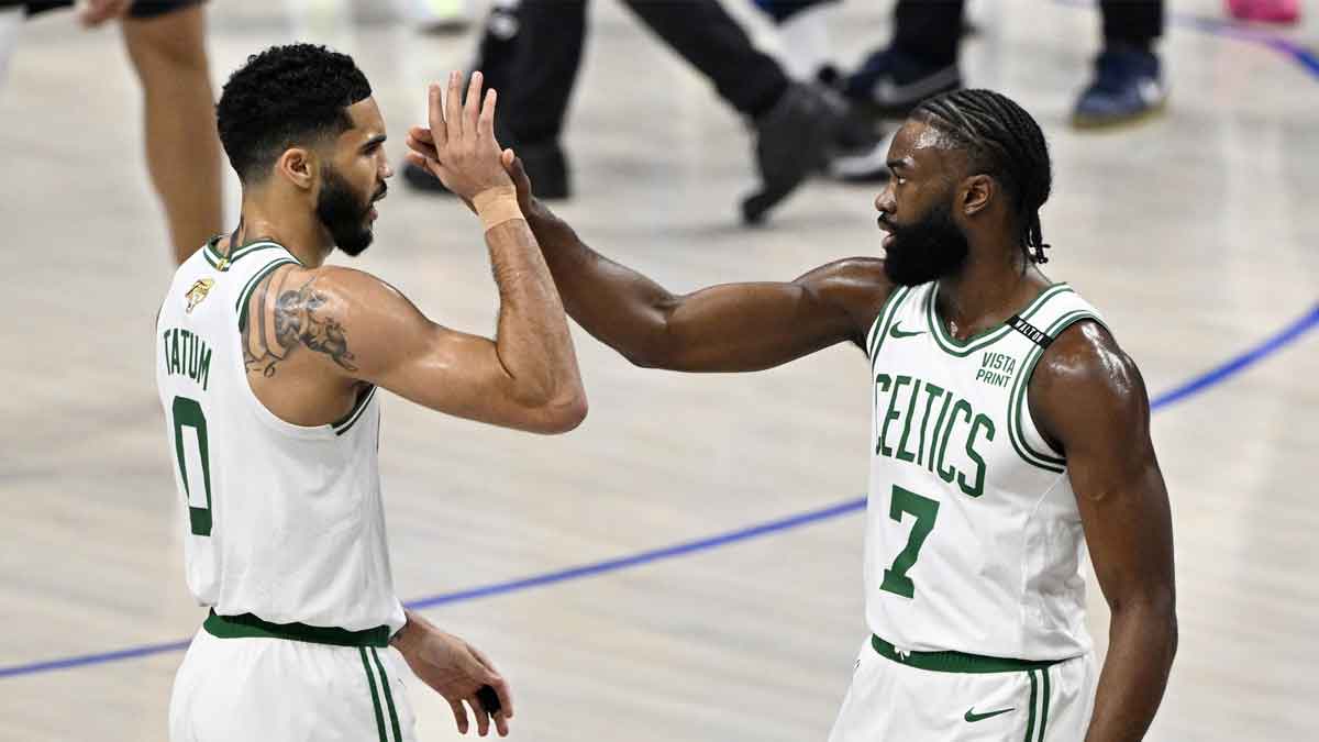 Boston Celtics forward Jayson Tatum (0) and guard Jaylen Brown (7) celebrate after a play during the first quarter in game three of the 2024 NBA Finals against the Dallas Mavericks at American Airlines Center
