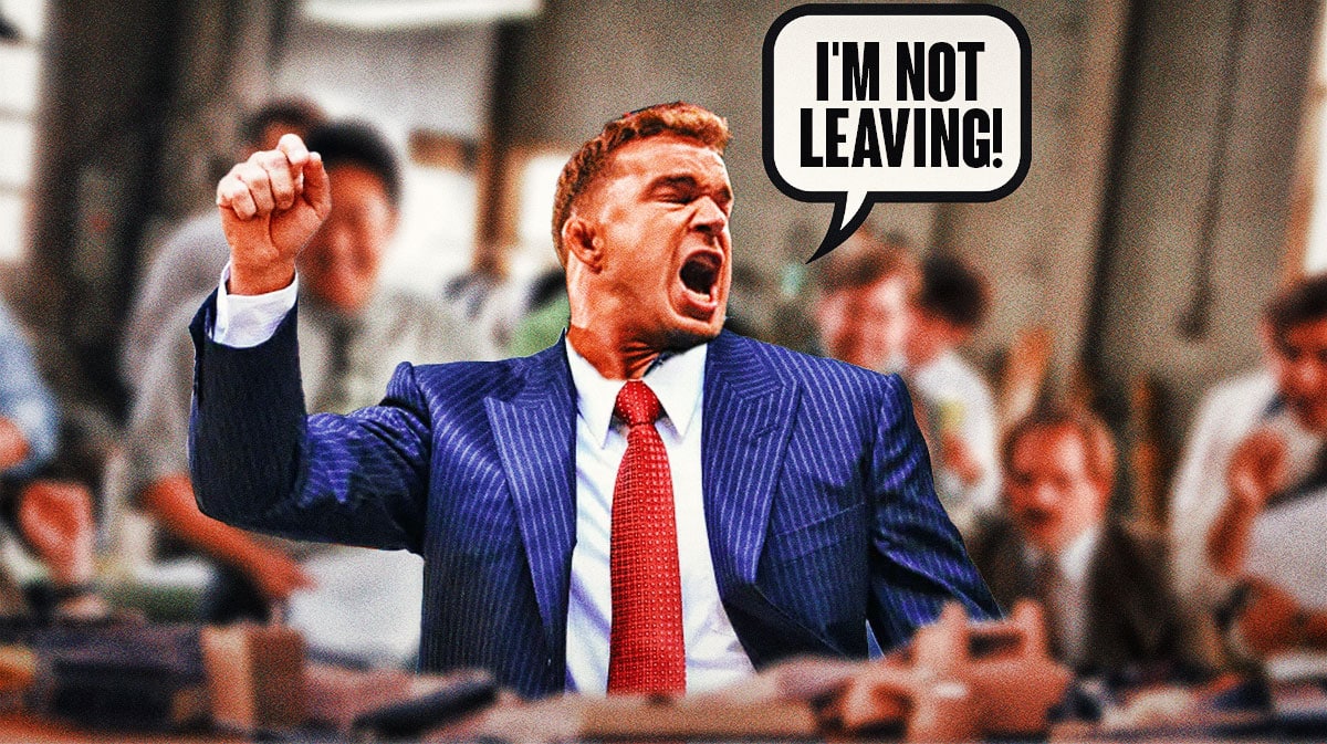 Chad Gable's head on Jordan Belfort's body with a text bubble reading "I'm not leaving!" with the WWE logo next to him and a background from the Wolf of Wall Street.