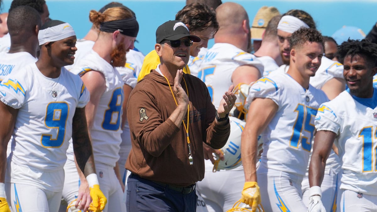 Los Angeles Chargers coach Jim Harbaugh interacts with his team during minicamp at the Hoag Performance Center.