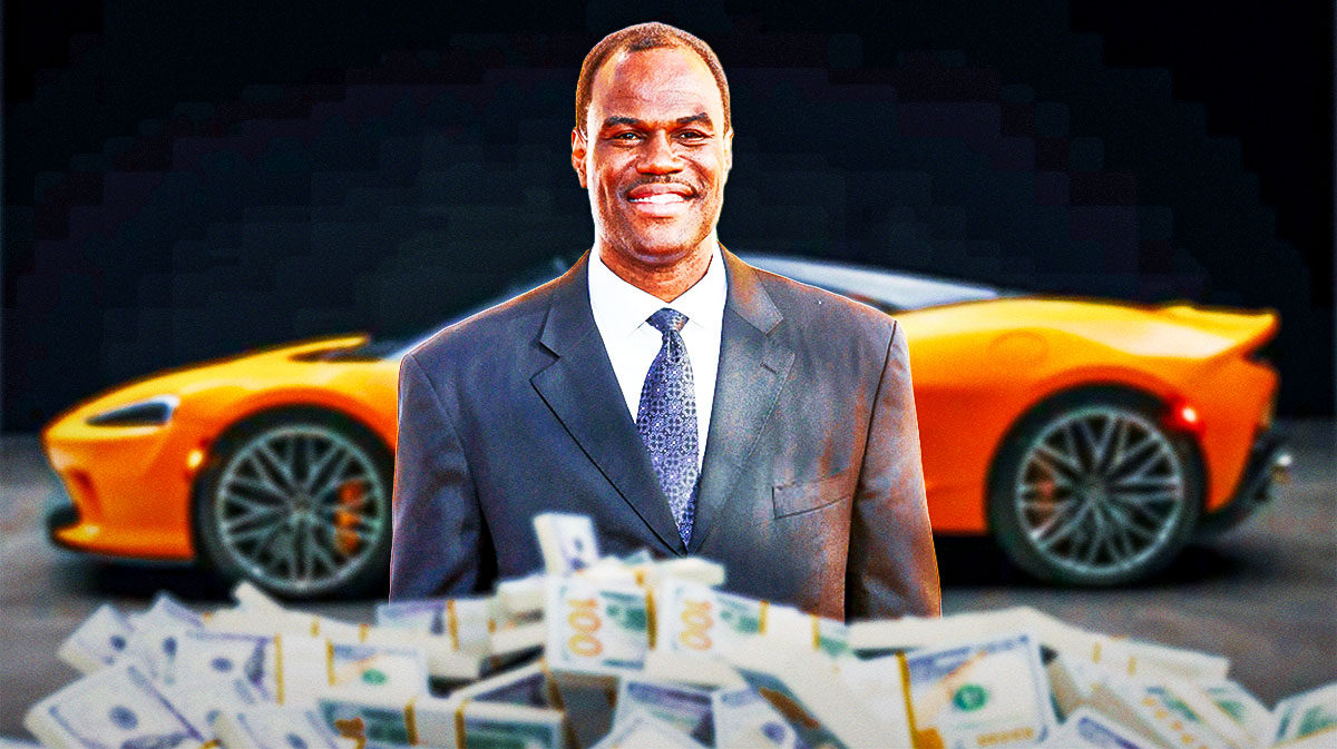 David Robinson in front of a car from his collection.