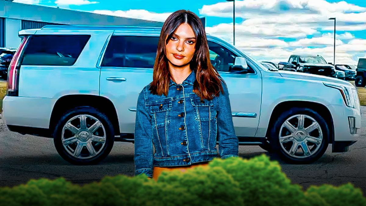 Emily Ratajkowski in front of a car from her collection.