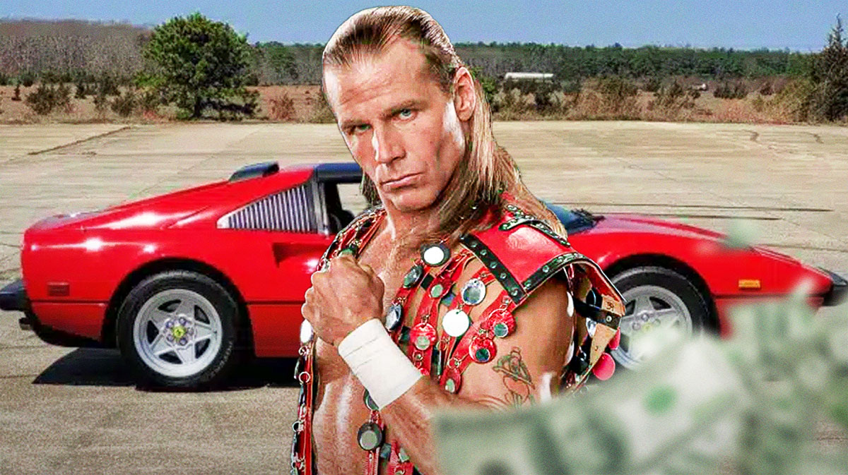 Shawn Michaels in front of a car from his collection.