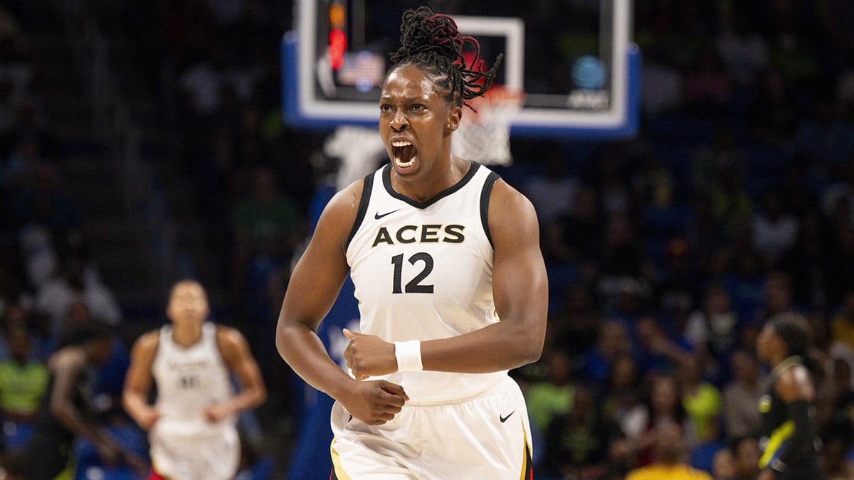 Las Vegas Aces guard Chelsea Gray (12) celebrates during the first half against the Dallas Wings during game three of the 2023 WNBA Playoffs at College Park Center. 
