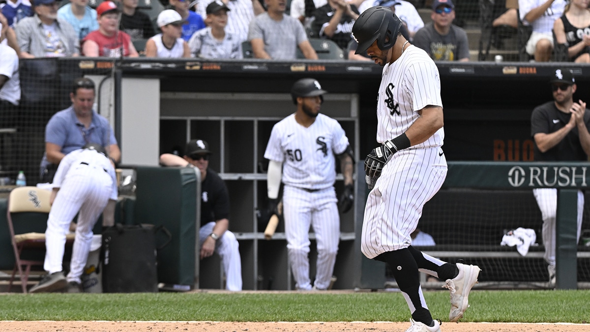 Chicago White Sox outfielder Tommy Pham (28) scores against the Houston Astros during the fifth inning at Guaranteed Rate Field