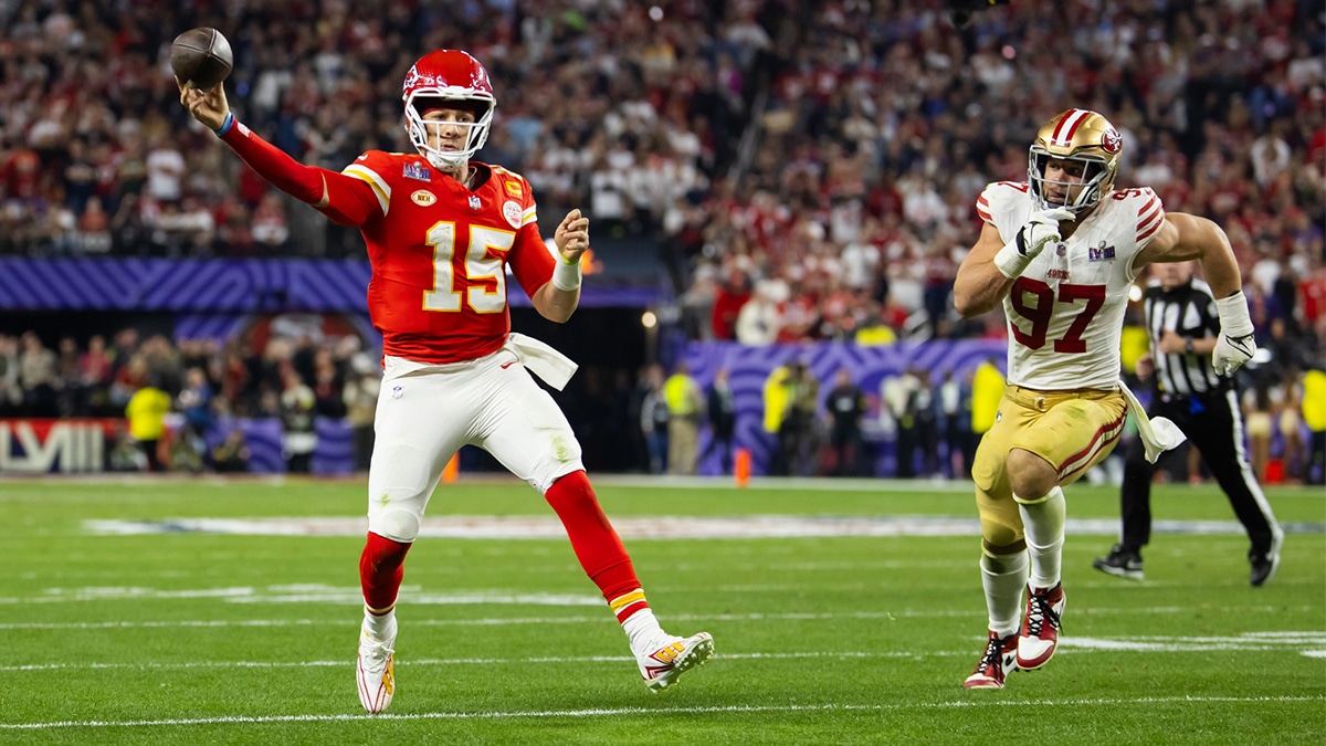Kansas City Chiefs quarterback Patrick Mahomes (15) throws a pass against San Francisco 49ers defensive end Nick Bosa (97) in the fourth quarter in Super Bowl LVIII at Allegiant Stadium