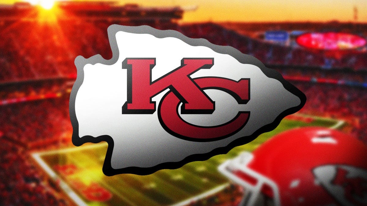 Chiefs logo stands in front of football field, medical emergency providers, BJ Thompson in background