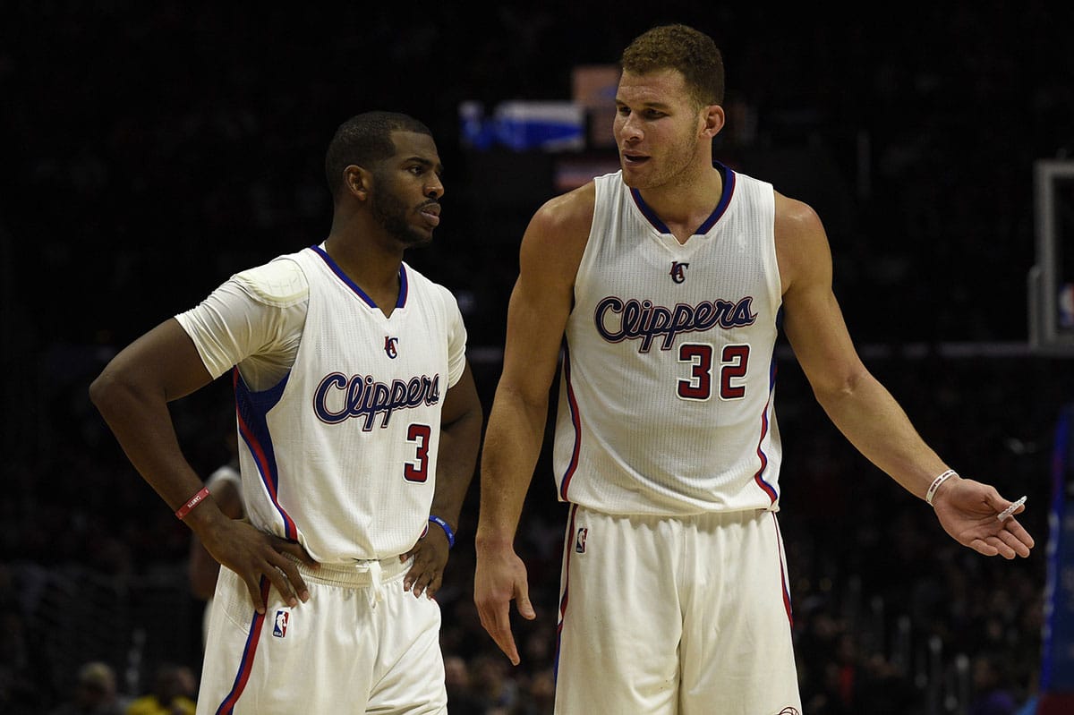 Los Angeles Clippers forward Blake Griffin (32) reacts as Los Angeles Clippers guard Chris Paul (3) looks on after a foul is called during the fourth quarter against the Utah Jazz at Staples Center. The Los Angeles Clippers won 101-97.