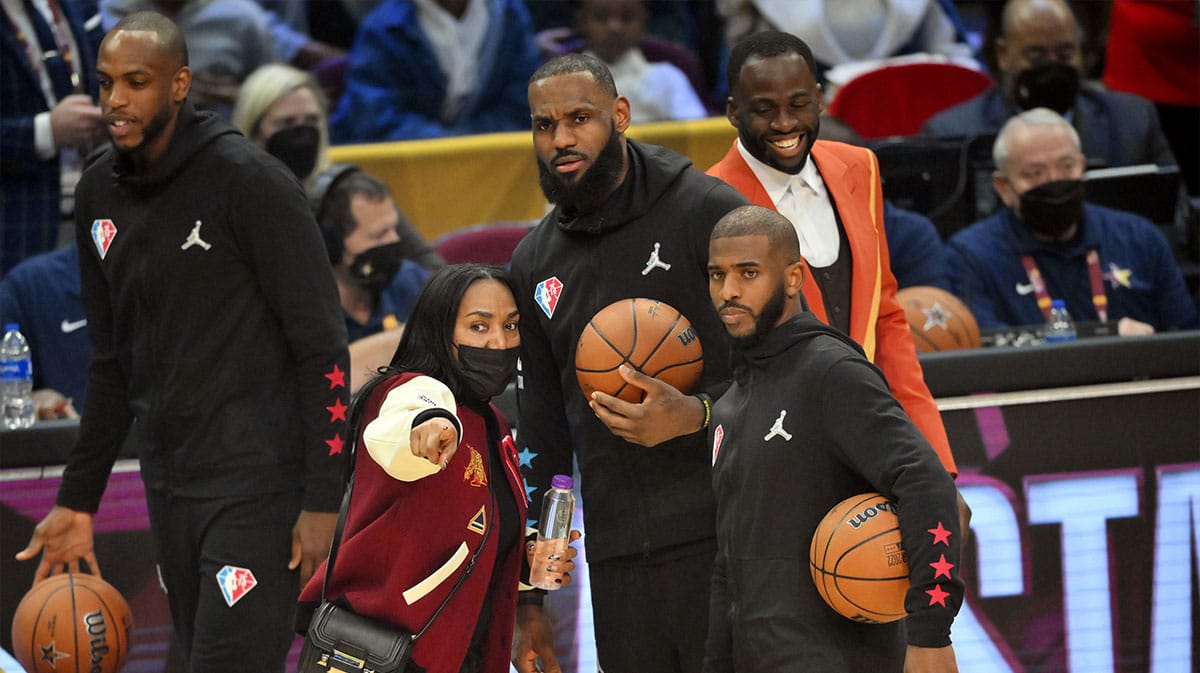 Team LeBron forward LeBron James and Chris Paul with Gloria James before the game between Team LeBron and Team Durant during the 2022 NBA All-Star Game at Rocket Mortgage FieldHouse. 