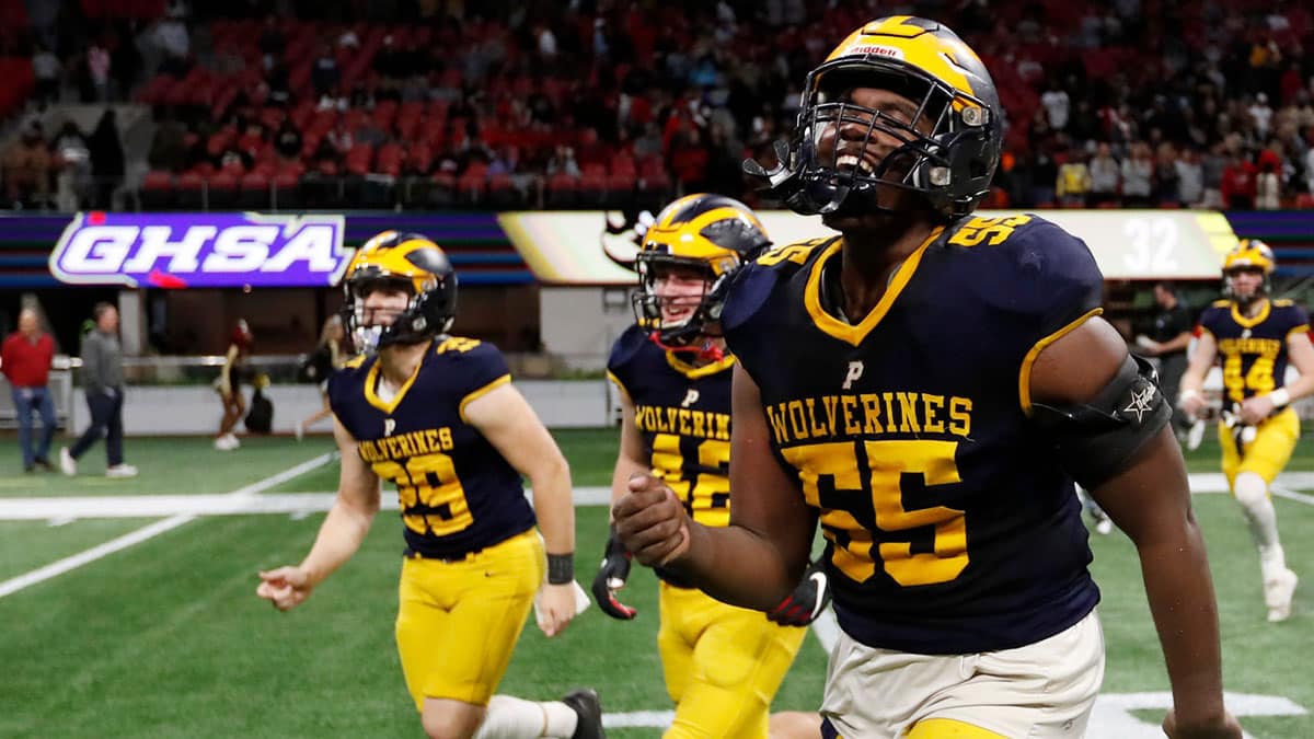 Prince Avenue's Christian Garrett (55) celebrates after winning the GHSA high school football Class A-Division 1 championship game against Swainsboro at Mercedes-Benz Stadium in Atlanta, on Monday, Dec. 11, 2023. Prince Avenue won 49-32.